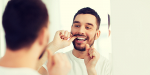 Man flossing